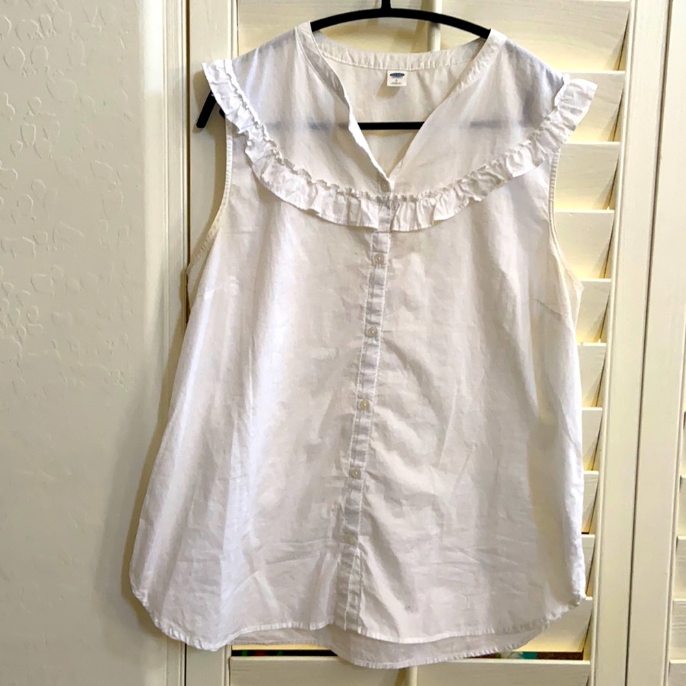 White sleeveless top
